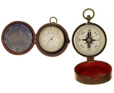 A VICTORIAN GILT BRASS POCKET BAROMETER, 4.5CM D, MAROON MOROCCO CASE, LATE 19TH C AND A GUNMETAL AND BRASS COMPASS IN LEATHE