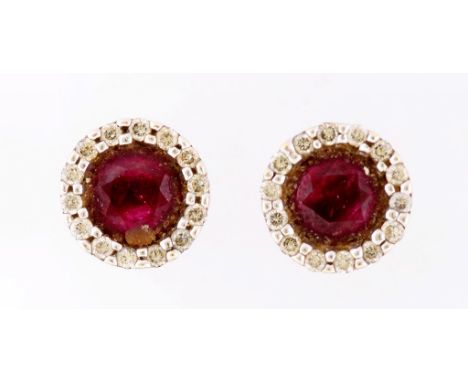 A PAIR OF RUBY AND DIAMOND STUD EARRINGS IN WHITE GOLD MARKED 375, 1.5G++IN NEED OF CLEANING