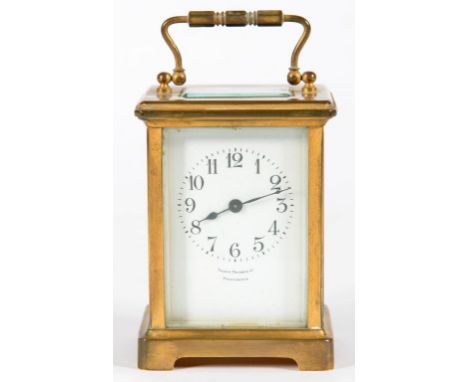 A NORTH AMERICAN GILT BRASS CARRIAGE TIMEPIECE, THE WHITE ENAMEL MASK DIAL INSCRIBED TILDEN THURBER CO PROVIDENCE, 11CM H EXC