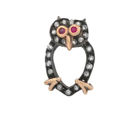 A Ruby and Diamond Pinmodelled as a stylised owl, the head and the oval openwork body set throughout with eight-cut diamonds,