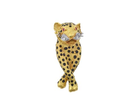 An Enamel, Ruby and Diamond Novelty Brooch  modelled as a stylised leopard, the yellow textured motif decorated throughout wi