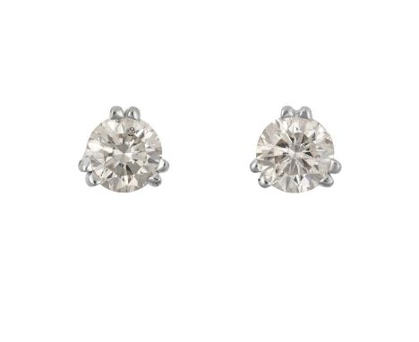 A Pair of Diamond Solitaire Earringsthe round brilliant cut diamonds in white double claw settings, total estimated diamond w