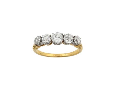 A Diamond Five Stone Ringthe graduated old cut diamonds in white claw settings, to a tapered shoulder plain polished shank, t