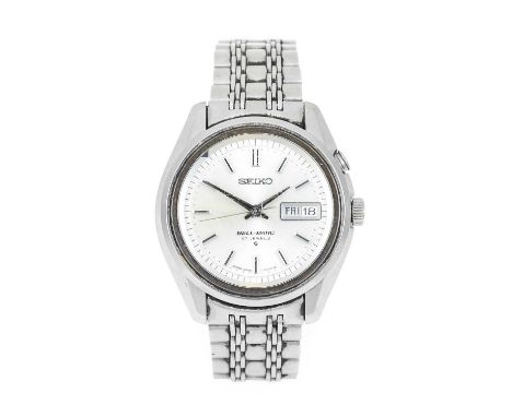 Seiko: A Stainless Steel Automatic Day/Date Centre Seconds Alarm Wristwatch, signed Seiko, model: Bell-Matic, ref: 4006-7012,