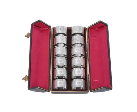 A Cased Set of Twelve Victorian or Edward VII Silver Plate Napkin-Rings,  Apparently Unmarked, Circa 1900 each circular and e