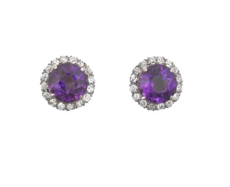 A Pair of Amethyst and Diamond Cluster Earringseach round cut amethyst within a border of old cut diamonds, in white claw set