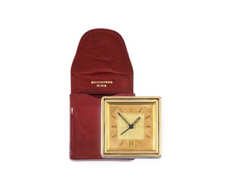 Boucheron: An Art Deco Travelling Alarm Timepiece, signed Boucheron, Paris, white metal case with engine turned panels and ri