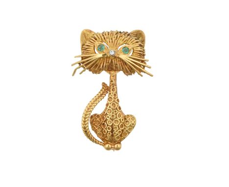 An 18 Carat Gold Emerald and Diamond Novelty Brooch, by Garrard & Co. modelled as a stylised cat, of yellow textured form wit