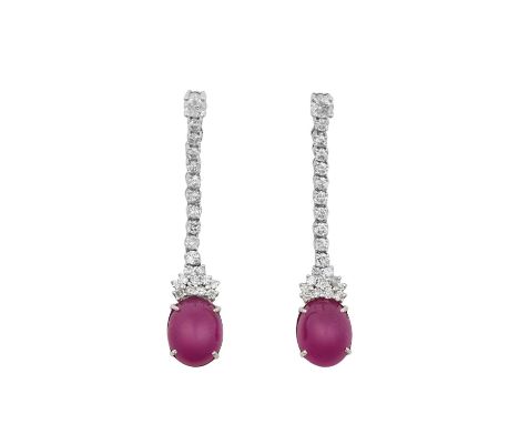 A Pair of 18 Carat White Gold Ruby and Diamond Drop Earringsa row of round brilliant cut diamonds suspends an oval cabochon r