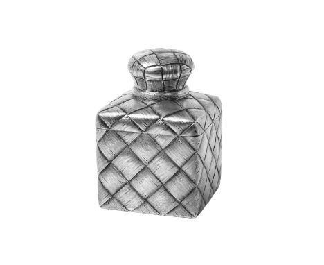 A Russian Silver Trompe L'oeil Tea-Caddy,  Cyrillic Makers Mark ПЕД, St Petersburg, 1882-1899 of square section, chased overa