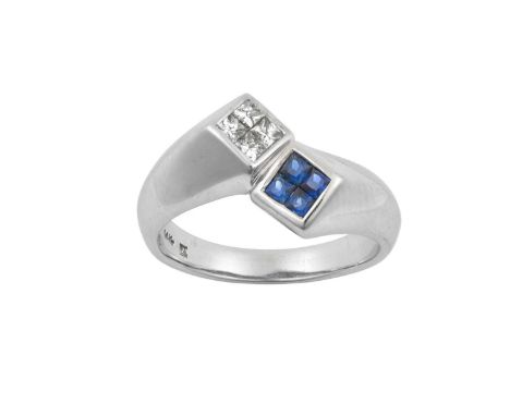 A Sapphire and Diamond Crossover Ringthe white crossover shank terminating to four calibré cut sapphires at one end and four 