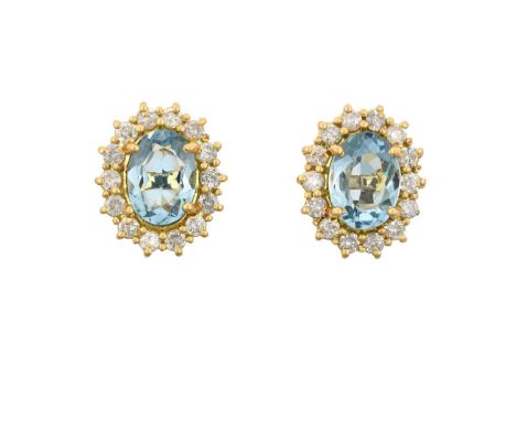 A Pair of 18 Carat Gold Aquamarine and Diamond Cluster Earringsthe oval cut aquamarines within a border of round brilliant cu