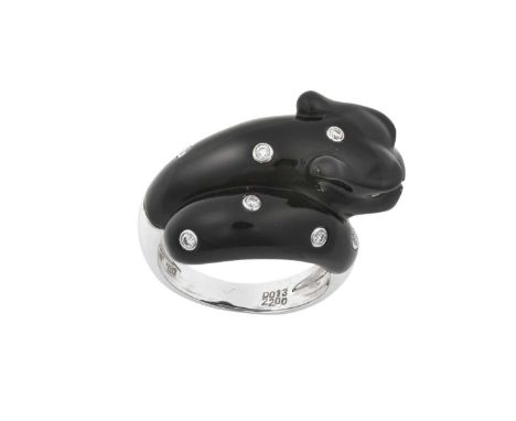 An Onyx and Diamond Crossover Ringthe white plain polished band terminating to a carved panther, inset with round brilliant c
