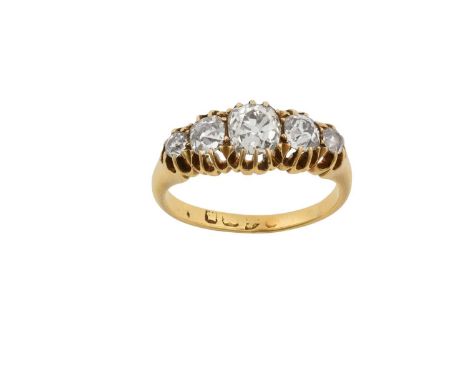 An 18 Carat Gold Diamond Five Stone Ringthe graduated old cut diamonds in yellow claw settings, to a plain polished shank, to