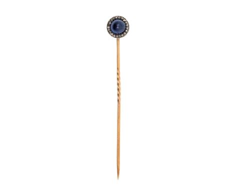 A Sapphire and Diamond Cluster Stick Pin, circa 1880the round cabochon sapphire within a border of rose cut diamonds, in whit