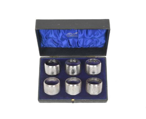A Cased Set of Six George V Silver Napkin-Rings,  by Colen Hewer Cheshire, Chester, 1912, 1913, 1915 and 1917 each circular a