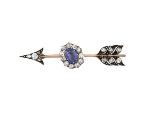 A Blue Stone and Diamond Arrow Broochthe point and feathers set throughout with old cut diamonds, with a cluster centrally co
