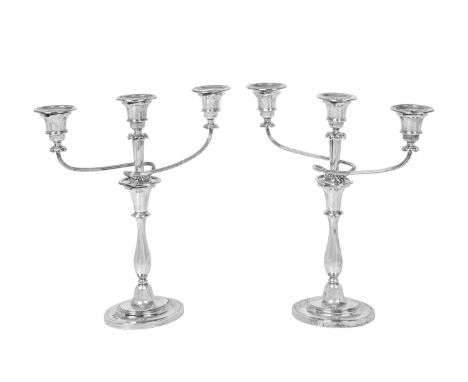 A Pair of George VI Silver Three-Light Candelabra,  by Richard Comyns, London, 1937 in the George III style, each on oval fil