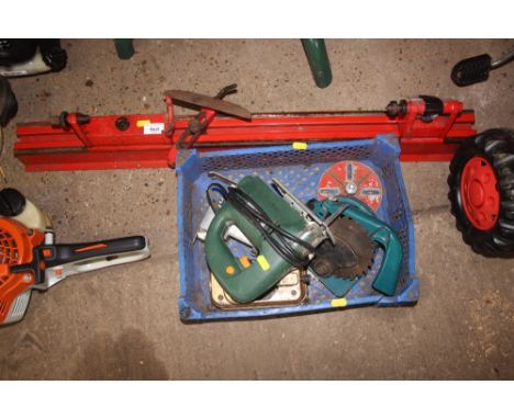A lathe together with a box of various hand tools