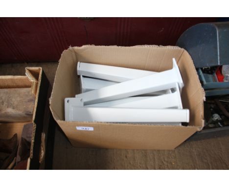 A box of white bench legs
