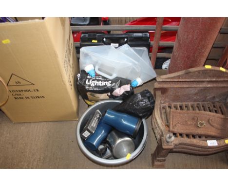 A bag of instant lighting charcoal; and various other camping equipment 