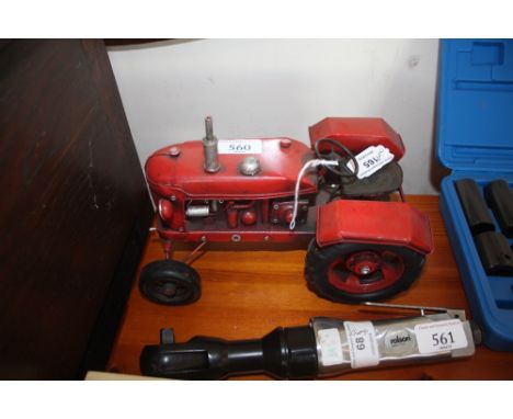 A tractor tinplate model