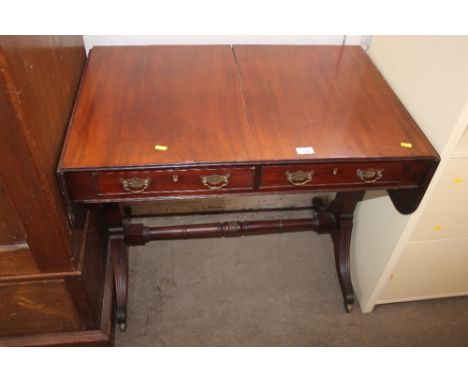 A mahogany sofa table fitted two drawers