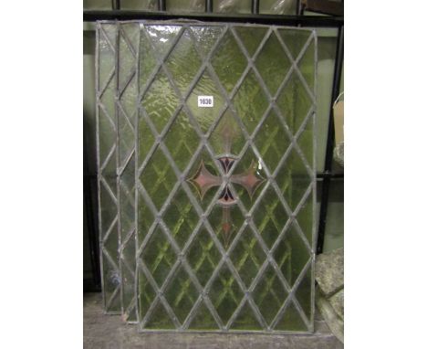 Three reclaimed green tinted leaded light casement window panels with diamond quarries and painted detail.