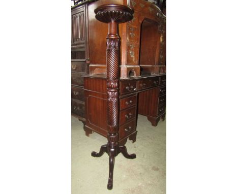 Mahogany torchere with spiral twist column and tripod base.