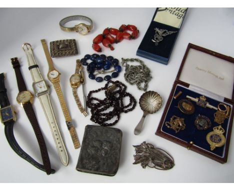 A mixed lot of jewellery to include a garnet bead necklace with gold clasp, two gold chains, a miniature prayer book with sil