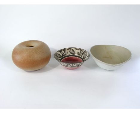 An unusual studio pottery vase of doughnut shaped form by Usch Spettigue of Ipswich with impressed seal mark to base SP, pape