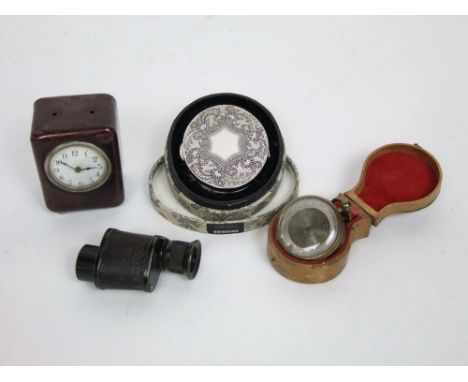 An Edwardian cased pocket barometer/compass, a monoculer, Marcel Rochas compact, etc