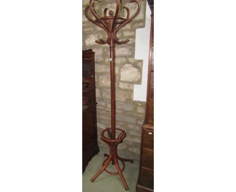 A Bentwood hat coat and stick stand of full height.