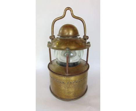 A good cast brass and glass storm lamp, 40 cm high approx.