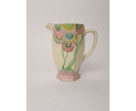 An A J Wilkinson Newport Pottery Clarice Cliff Honey Glaze jug of octagonal form with pastel coloured Rhodanth pattern detail