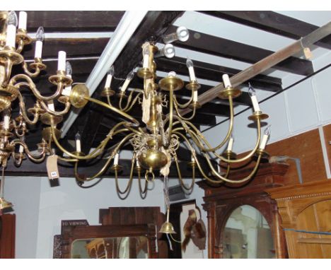 Large Dutch style brass stepped ceiling light with long scrolled branches