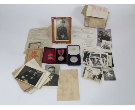 A George V Faithful service medal named Edward Parry Pritchard together with a collection of family ephemera to include an ar