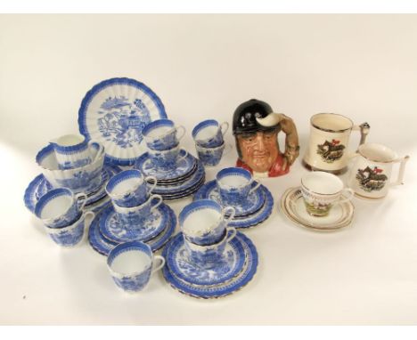 A large Royal Doulton character jug - Gone Away D6531, together with two tankards with hunting scene decoration and a similar