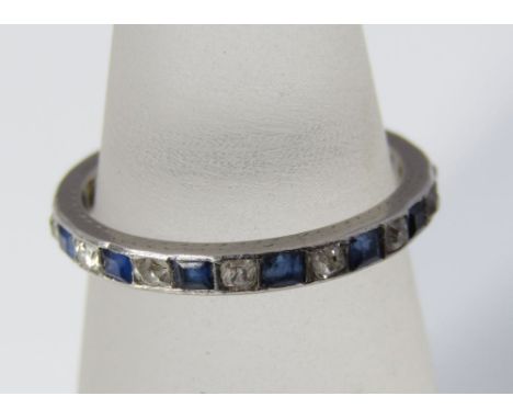 A sapphire and diamond eternity ring in white metal, size K, 2g