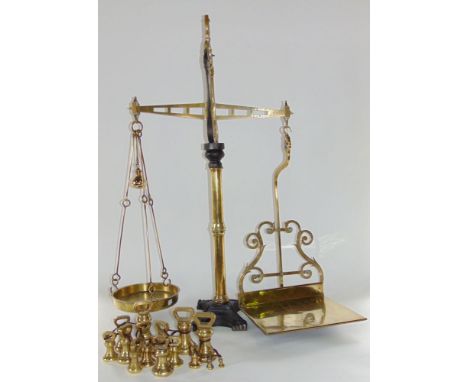 A good quality set of cast brass and cast iron weighing scales by Yandell & Son of Bristol, inscribed 'Class B' and 'To weigh