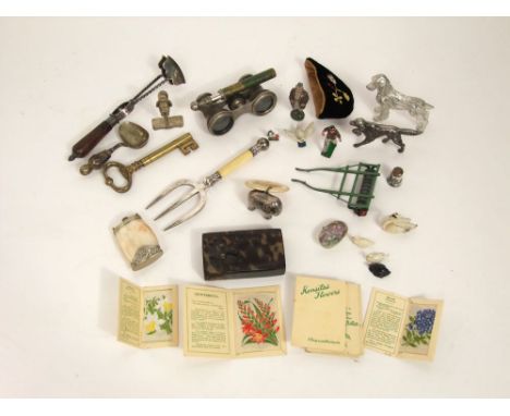 Opera glasses, sardine tongs, bread fork, Brittains lead farm characters  key corkscrew, two white metal dogs, etc