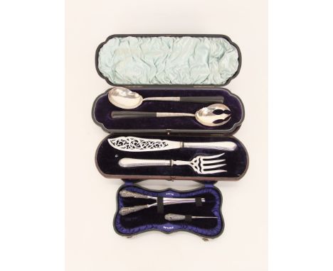 Cased set of horn handled silver servers; together with a further cased set of fish serving cutlery comprising fork and knife