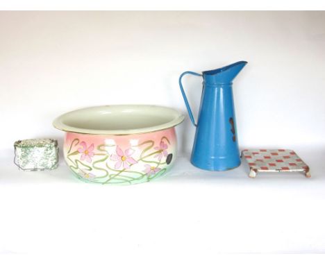 Four pieces of French enamel to include a baby bath decorated with scrolled foliage, blue enamel jug and two others. (4)