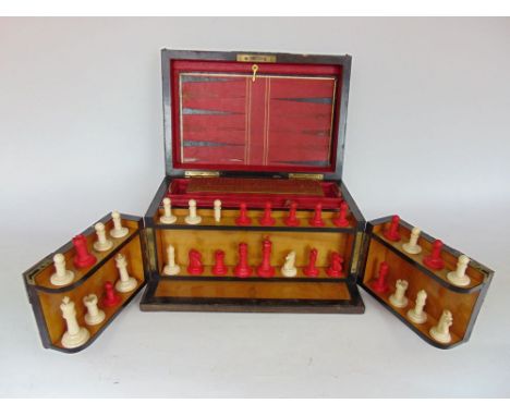 A good 19th century coromandel and gilt metal games compendium, the hinged front enclosing an ivory and stained ivory chess s