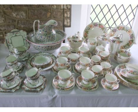 An extensive collection of Paragon china Country Lane pattern wares including seven dinner plates, sauce boat and stand, six 