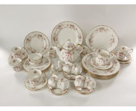 A quantity of Paragon china Victoriana Rose pattern wares comprising six dinner plates, six dessert plates, tea pot, cake pla