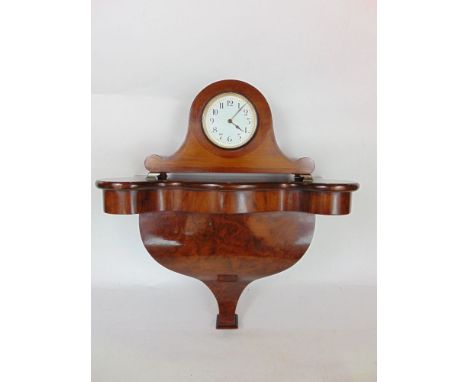 An Edwardian walnut cased mantle clock of Napoleon hat type shape with 8 cm approx enamel dial, 30 cm wide approx together wi