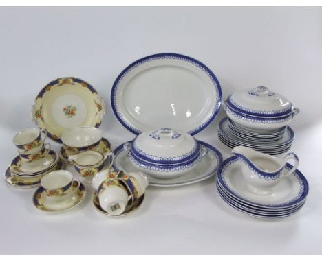 A collection of Losol ware pattern blue and white printed dinnerwares comprising a pair of tureens and covers, sauce boat, tw