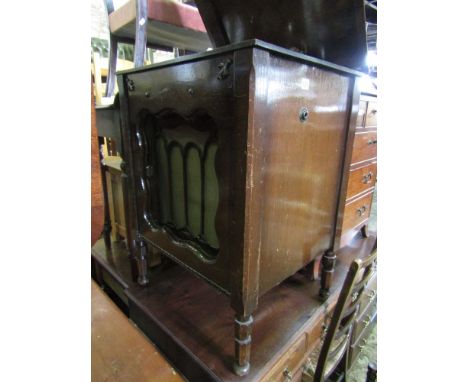 A vintage oak gramophone floorstanding model by Gilbert with tambour front enclosing speaker, chrome fittings and original Gi