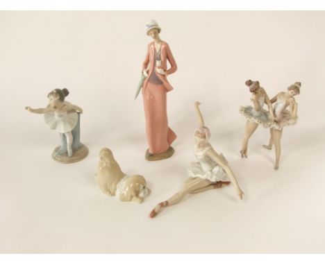 A Lladro figure group of a pair of ballet dancers, together with a further Lladro figure seated ballet dancer, a Nao figure o